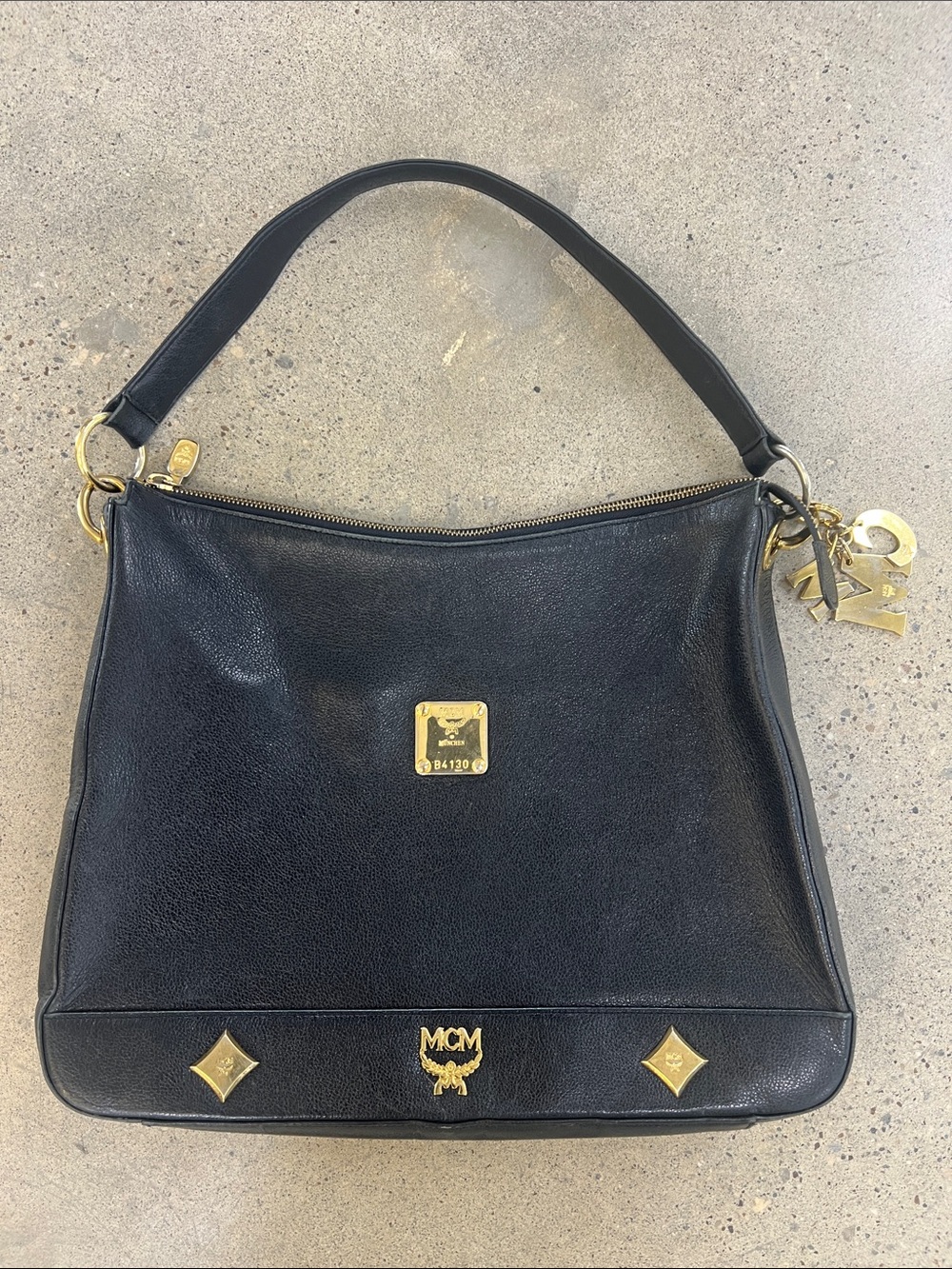 MCM Black Leather Shoulder Hobo with Gold Accents
